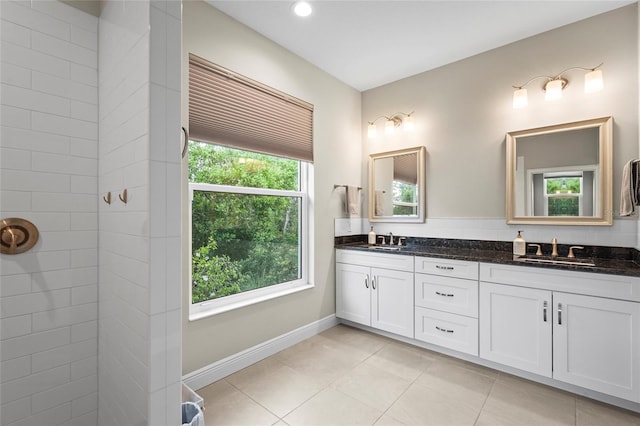 18050 Wooden Skiff Ct, Nokomis, FL 34275 - full bath with double vanity, tiled shower, and tile patterned floors