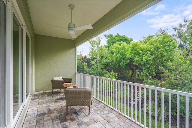 18050 Wooden Skiff Ct, Nokomis, FL 34275 - balcony featuring a ceiling fan