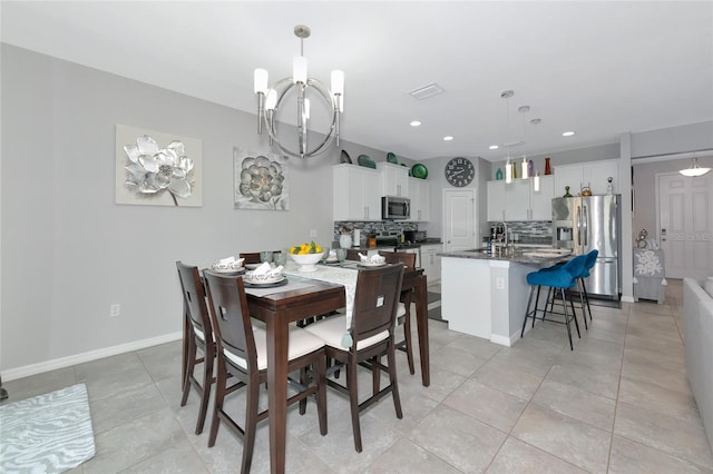 5134 Jackel Chase Dr, Wimauma, FL 33598 - dining room featuring a chandelier, recessed lighting, and light tile patterned flooring
