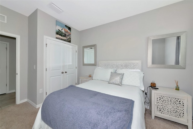 5134 Jackel Chase Dr, Wimauma, FL 33598 - bedroom featuring light carpet and a closet