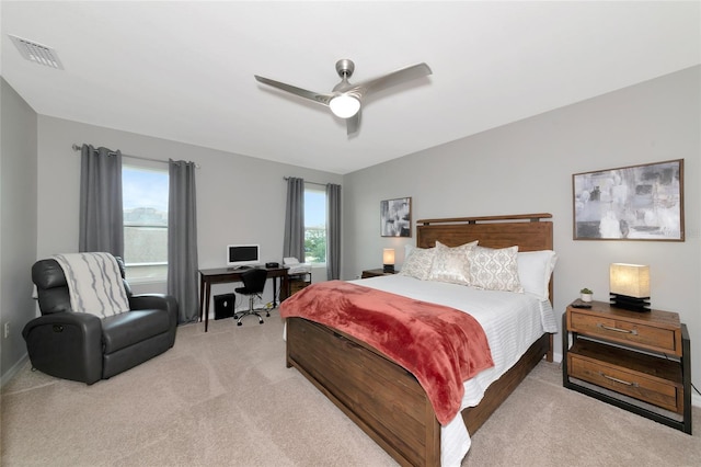 5134 Jackel Chase Dr, Wimauma, FL 33598 - bedroom featuring light colored carpet, a ceiling fan, and a desk