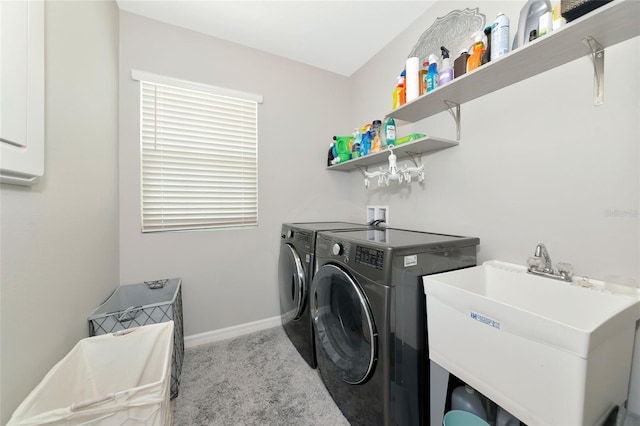 5134 Jackel Chase Dr, Wimauma, FL 33598 - laundry room featuring washer and dryer and carpet flooring