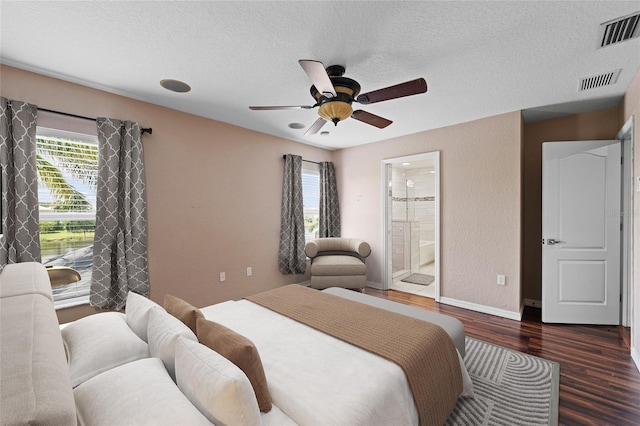 7036 Chatum Light Run, Bradenton, FL 34212 - bedroom with wood finished floors, a textured ceiling, ensuite bathroom, and ceiling fan