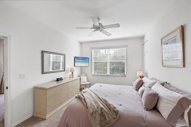 8335 Glenrose Way Unit 1513, Sarasota, FL 34238 - bedroom with light carpet and ceiling fan