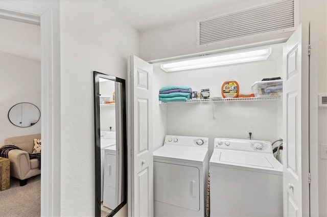 8335 Glenrose Way Unit 1513, Sarasota, FL 34238 - washroom featuring washing machine and dryer and carpet