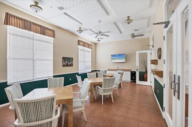 8335 Glenrose Way Unit 1513, Sarasota, FL 34238 - tiled dining room with coffered ceiling and a ceiling fan