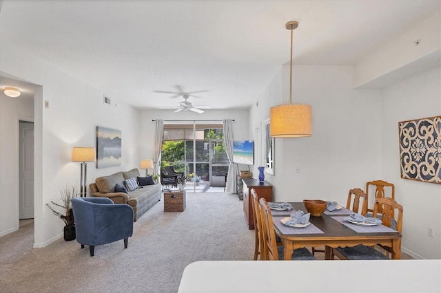 8335 Glenrose Way Unit 1513, Sarasota, FL 34238 - dining space featuring light carpet and ceiling fan