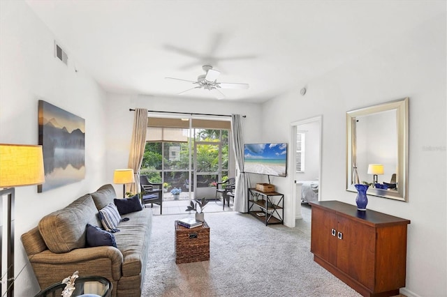8335 Glenrose Way Unit 1513, Sarasota, FL 34238 - living room featuring a ceiling fan and carpet