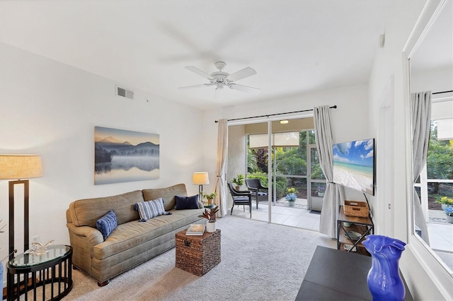 8335 Glenrose Way Unit 1513, Sarasota, FL 34238 - carpeted living room featuring ceiling fan and healthy amount of natural light
