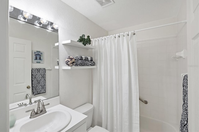 8335 Glenrose Way Unit 1513, Sarasota, FL 34238 - bathroom with shower / bath combination with curtain, vanity, and a textured wall