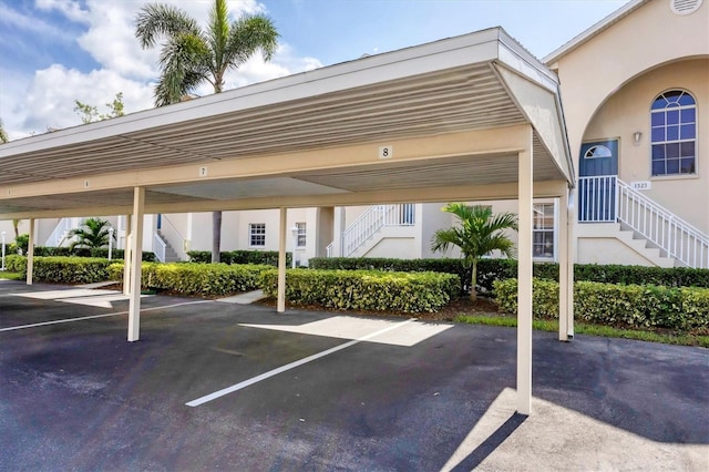 8335 Glenrose Way Unit 1513, Sarasota, FL 34238 - covered parking lot featuring stairway