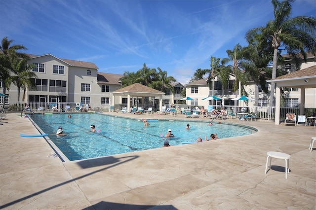 8335 Glenrose Way Unit 1513, Sarasota, FL 34238 - community pool featuring a patio area