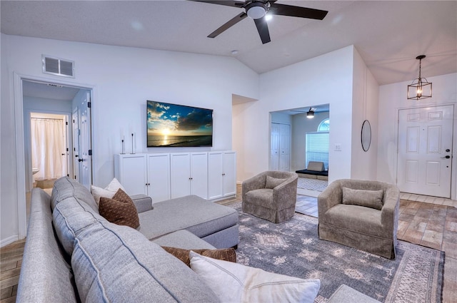 4204 Malickson Dr, Parrish, FL 34219 - living area featuring a ceiling fan, wood finished floors, and lofted ceiling