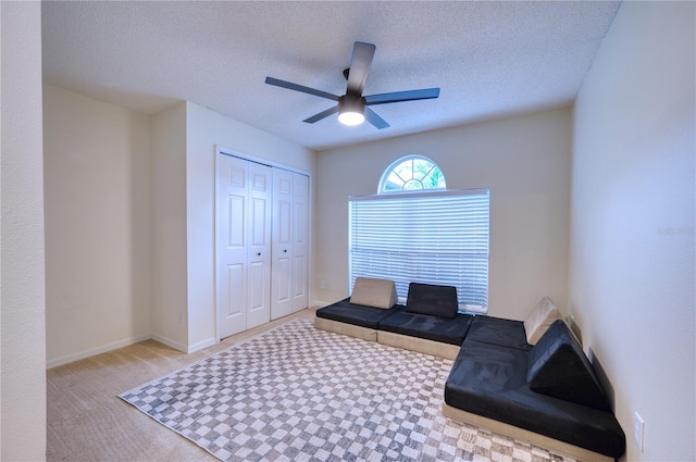4204 Malickson Dr, Parrish, FL 34219 - sitting room featuring carpet flooring, a ceiling fan, and a textured ceiling