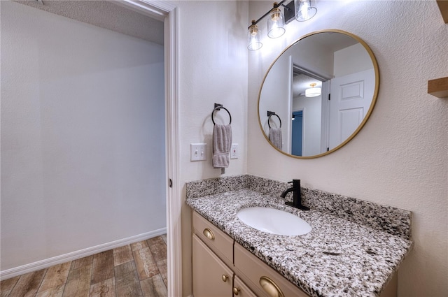 4204 Malickson Dr, Parrish, FL 34219 - bathroom with wood finished floors and vanity