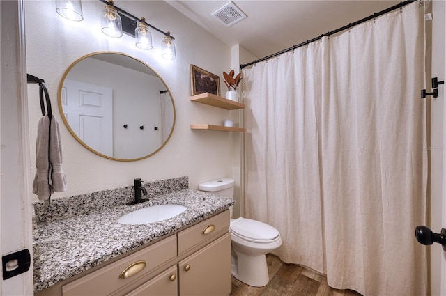 4204 Malickson Dr, Parrish, FL 34219 - full bathroom with wood finished floors and vanity