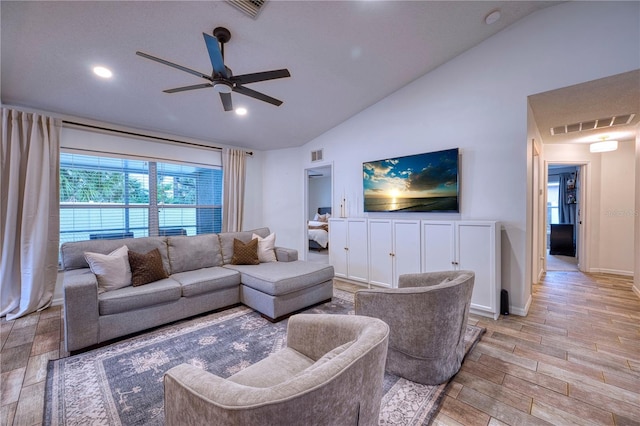 4204 Malickson Dr, Parrish, FL 34219 - living room featuring vaulted ceiling, light wood-style flooring, a ceiling fan, and recessed lighting
