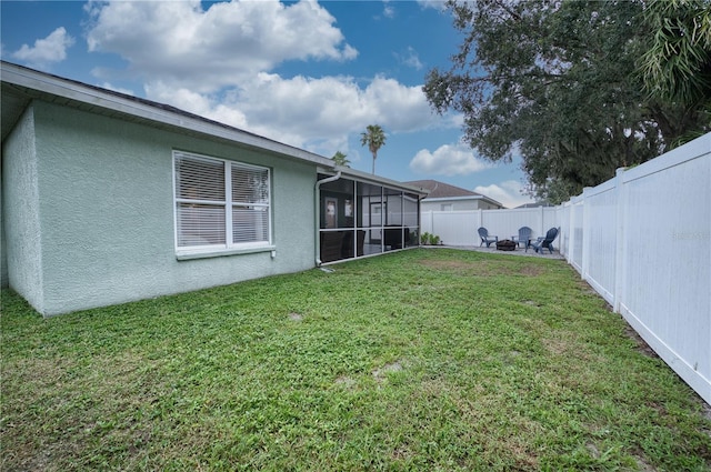 4204 Malickson Dr, Parrish, FL 34219 - fenced backyard featuring a sunroom and a patio area