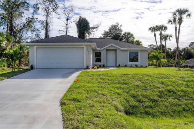 2703 Carmelia St, North Port, FL 34288 - single story home with stucco siding, driveway, a garage, and a front yard