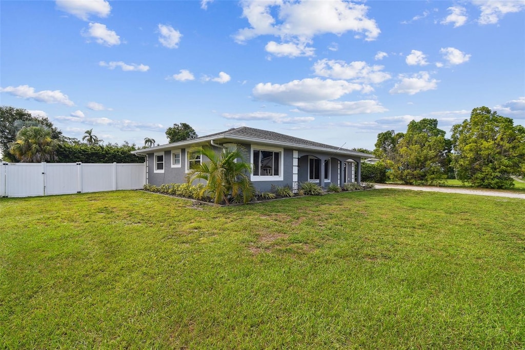 303 45th St W, Bradenton, FL 34209 - single story home featuring a gate and stucco siding