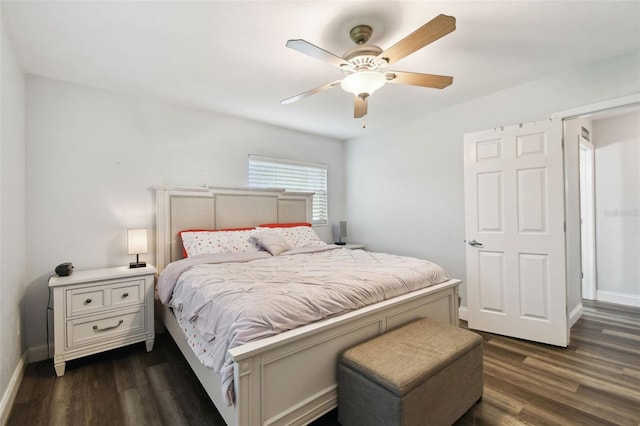 303 45th St W, Bradenton, FL 34209 - bedroom with dark wood-type flooring and a ceiling fan