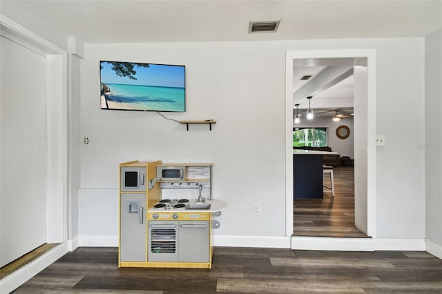 303 45th St W, Bradenton, FL 34209 - detailed view of wood finished floors and a ceiling fan