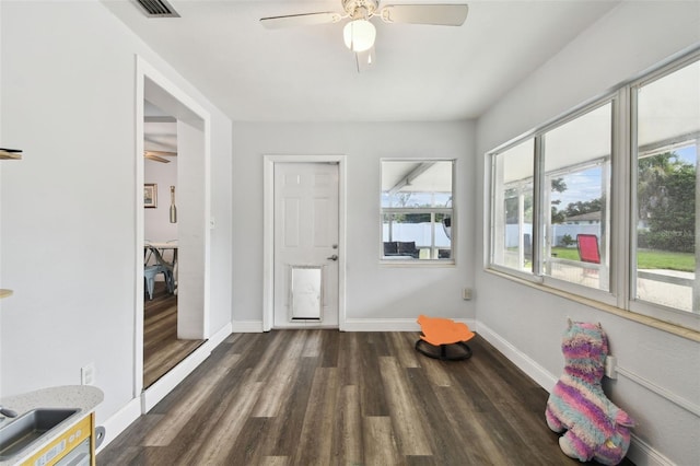 303 45th St W, Bradenton, FL 34209 - foyer with a ceiling fan and wood finished floors