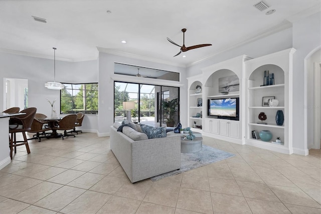 13818 Milan Ter, Lakewood Ranch, FL 34202 - living room featuring light tile patterned flooring, built in shelves, ornamental molding, ceiling fan, and recessed lighting
