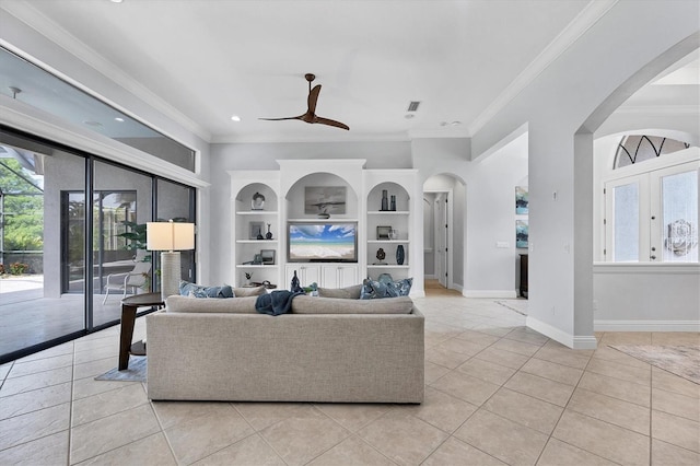 13818 Milan Ter, Lakewood Ranch, FL 34202 - living room featuring arched walkways, ornamental molding, ceiling fan, light tile patterned floors, and recessed lighting