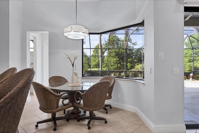 13818 Milan Ter, Lakewood Ranch, FL 34202 - dining area with baseboards and tile patterned floors