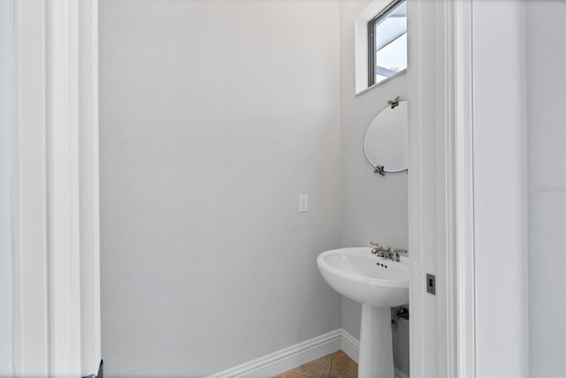 13818 Milan Ter, Lakewood Ranch, FL 34202 - bathroom with tile patterned flooring and baseboards