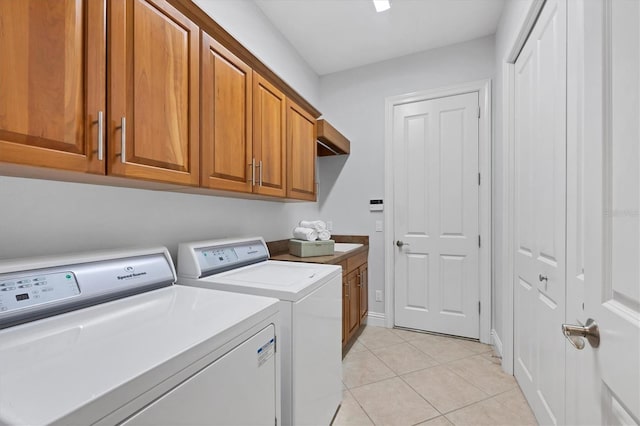 13818 Milan Ter, Lakewood Ranch, FL 34202 - laundry area with washer and dryer, cabinet space, and light tile patterned floors