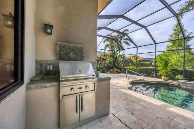 13818 Milan Ter, Lakewood Ranch, FL 34202 - view of patio / terrace with area for grilling, glass enclosure, and a pool with connected hot tub