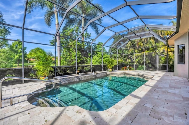 13818 Milan Ter, Lakewood Ranch, FL 34202 - view of swimming pool featuring a pool with connected hot tub, a patio, and a lanai