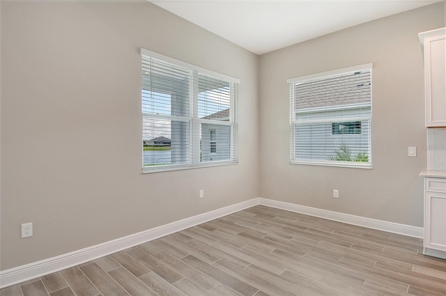 14312 Skipping Stone Loop, Parrish, FL 34219 - spare room with light wood-style floors