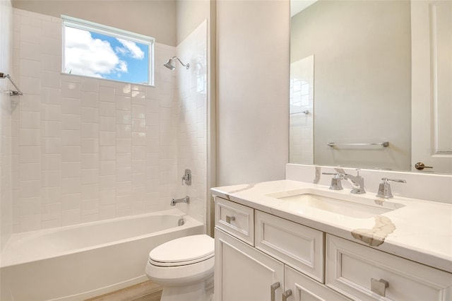 14312 Skipping Stone Loop, Parrish, FL 34219 - bathroom featuring vanity, shower / tub combination, and wood finished floors
