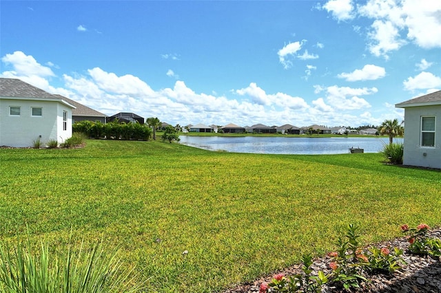 14312 Skipping Stone Loop, Parrish, FL 34219 - view of grassy yard with a water view and a residential view