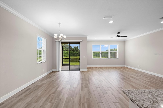 5174 78th St Cir E, Bradenton, FL 34203 - empty room featuring plenty of natural light, a chandelier, light wood-style floors, crown molding, and recessed lighting