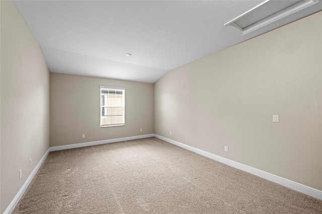 5174 78th St Cir E, Bradenton, FL 34203 - unfurnished room with carpet flooring and vaulted ceiling