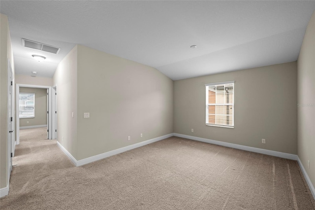 5174 78th St Cir E, Bradenton, FL 34203 - unfurnished room featuring carpet flooring and vaulted ceiling