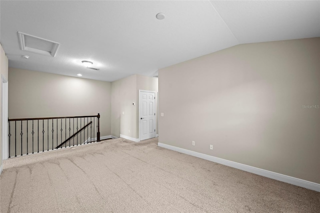 5174 78th St Cir E, Bradenton, FL 34203 - carpeted empty room with lofted ceiling and attic access