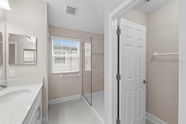 5174 78th St Cir E, Bradenton, FL 34203 - full bath with vanity, a shower stall, and tile patterned floors