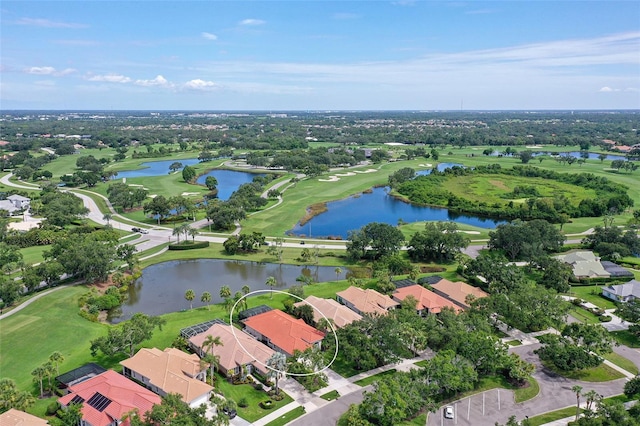 7868 Chick Evans Pl, Sarasota, FL 34240 - aerial view of property and surrounding area featuring nearby suburban area, a nearby body of water, and a golf course