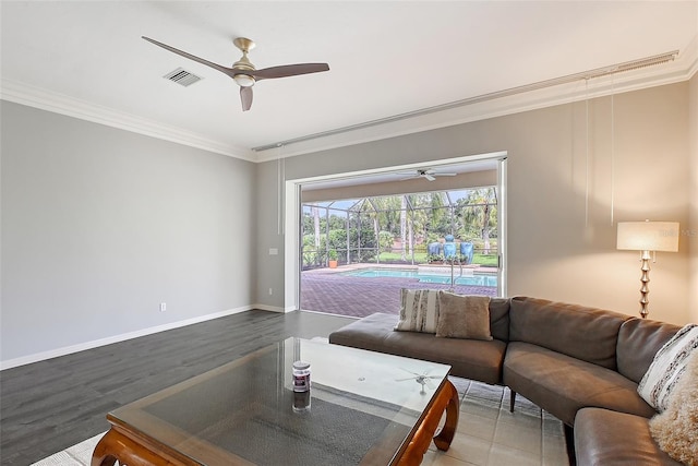 7868 Chick Evans Pl, Sarasota, FL 34240 - living room featuring ceiling fan, crown molding, and wood finished floors