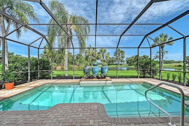 7868 Chick Evans Pl, Sarasota, FL 34240 - swimming pool with glass enclosure, a water view, and a patio area