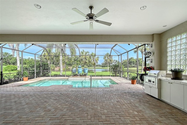 7868 Chick Evans Pl, Sarasota, FL 34240 - outdoor pool featuring area for grilling, a patio area, ceiling fan, and a lanai