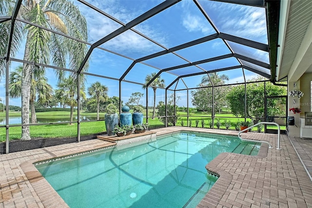 7868 Chick Evans Pl, Sarasota, FL 34240 - swimming pool with a water view, a patio, glass enclosure, and a lawn