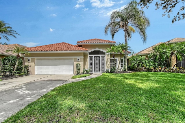 7868 Chick Evans Pl, Sarasota, FL 34240 - mediterranean / spanish-style home featuring stucco siding, a garage, a front yard, concrete driveway, and a tile roof
