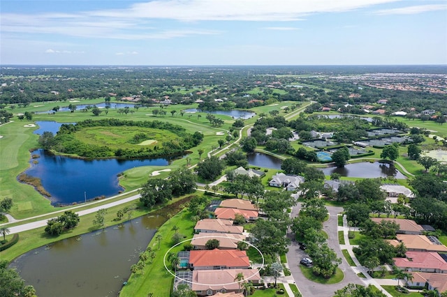 7868 Chick Evans Pl, Sarasota, FL 34240 - aerial perspective of suburban area with a golf club and a nearby body of water