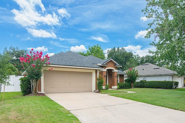 572 Sparrow Branch Cir, Saint Johns, FL 32259 - ranch-style home with an attached garage, concrete driveway, stucco siding, and a shingled roof
